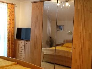 Telewizja i/lub zestaw kina domowego w obiekcie Ferienwohnung GIA