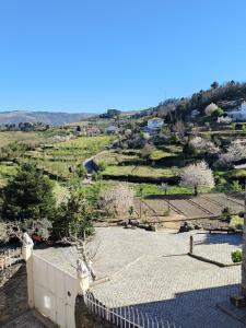 a view from the roof of a house at Blue House in Ucanha