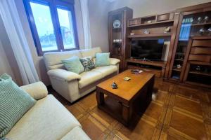 a living room with two couches and a coffee table at R2R - Casa Los Abuelos - C19A02 in Gormazo