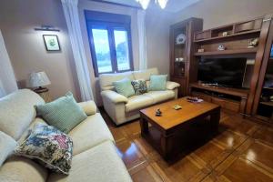 a living room with two couches and a coffee table at R2R - Casa Los Abuelos - C19A02 in Gormazo +48 photos