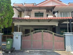 a red gate in front of a house at Fairuz Homestay Ipoh in Ipoh
