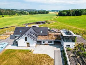 an aerial view of a house with a large yard at Studio V Šachu-3 by Interhome in Dačice +30 photos