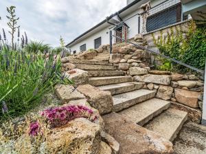 a set of stone stairs in front of a house at Studio V Šachu-4 by Interhome in Dačice