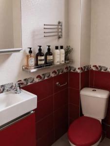 a bathroom with a toilet and a sink at Sea & Sun Grigoleti in Grigoleti +26 photos