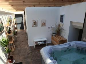 a bathroom with a tub in a room at Poza Horyzont in Korbielów +150 photos