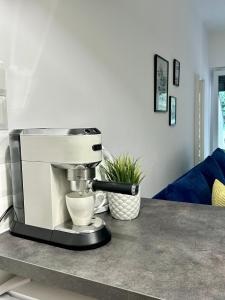 a mixer sitting on top of a counter at Apartament TU Cichowo in Cichowo