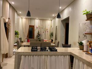 a kitchen with a stove top in a room at Beach Chalet Preá in Prea