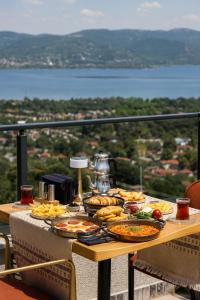 a table with many plates of food on it at Best Western Plus Sapanca in Sapanca