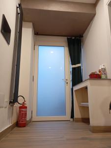 a large door in a room with a fire hydrant at Borgo Mantova in Potenza