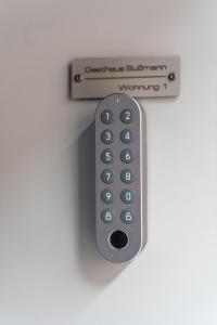 a remote control is attached to a wall at Ferienwohnung 1 Gasthaus Bußmann Vreden in Vreden