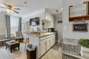 a kitchen with a sink and a counter at Polk 401 in Nashville
