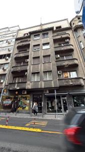 a building on the corner of a city street at Cozy 5 in Belgrade