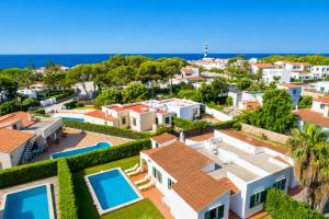 a villa with a view of the ocean at Villa Gelabert Ametller in Cala en Bosc