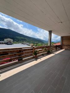 a view from the balcony of a house at Apartment MILU in Mestia