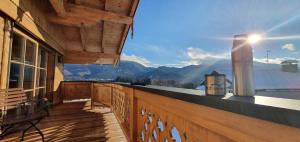 a balcony with a view of a mountain at Chalet am Wetterkreuz in Reit im Winkl