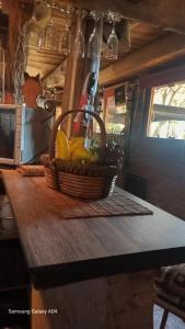 a basket of vegetables sitting on top of a table at La Agraria in Junín +6 photos