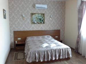 En eller flere senger på et rom på Hotel Sharm
