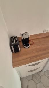 a kitchen counter with a toaster on a counter top at ALBI Logement spacieux in Albi