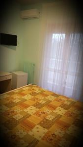 Postel nebo postele na pokoji v ubytování Villa Erry