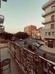 a view of a city street from a balcony at B&B Rosy in Corato