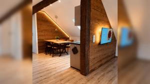 a kitchen and a dining room in a house at Roserhof Gengenbach in Gengenbach
