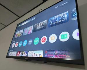 a television screen with a bunch of apps on it at Santa lucia in Panama City