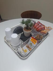 a tray with plates and food on a table at Santa lucia in Panama City