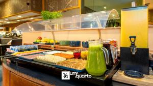 a buffet line with different types of food and drinks at Edifício Praça Osório in Curitiba +41 photos