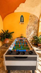 a game table in a living room with at Apartment La Bigatera in Castelveccana +23 photos