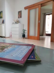 a book sitting on top of a table at Apartmán Nádvorie in Levoča