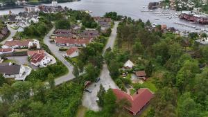 an aerial view of a small town next to a river at Vaicay Garden Resort in Arendal