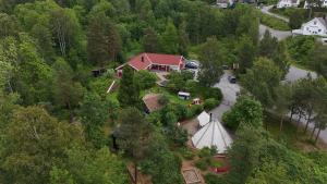 an aerial view of a house in the woods at Vaicay Garden Resort in Arendal