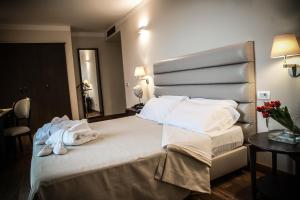 Postel nebo postele na pokoji v ubytování Villa Giorgia Albergo in Collina