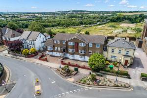 an overhead view of a town with houses and a street at Granby Hotel in Gravesend