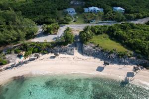 an aerial view of an island with a beach at The Anchorage at Rainbow Bay, Eleuthera in Hatchet Bay Limited Settlement