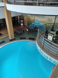 an overhead view of a large swimming pool at Villa Celia -New Cairo in Cairo