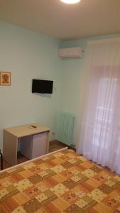 TV a/nebo společenská místnost v ubytování Villa Erry