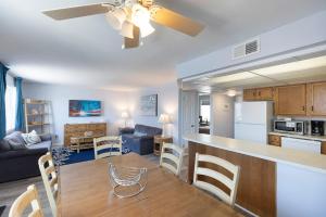 a kitchen and living room with a kitchen and a living room at Astronaut Motel in Wildwood Crest
