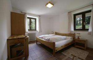 Postel nebo postele na pokoji v ubytování Hotel Garni Gonzaga
