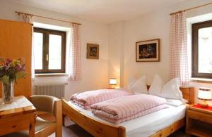 Postel nebo postele na pokoji v ubytování Hotel Garni Gonzaga