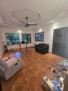 a living room with a couch and a table at Mansion Sublime in Chitré