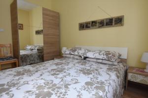 Postel nebo postele na pokoji v ubytování Apartment Stella