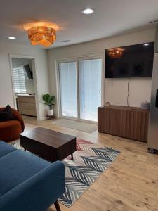 a living room with a couch and a coffee table at Cute cottage in Sunrise Beach in Sunrise Beach