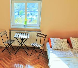 Postel nebo postele na pokoji v ubytování Lidi Guesthouse