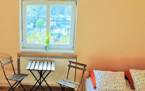 Postel nebo postele na pokoji v ubytování Lidi Guesthouse