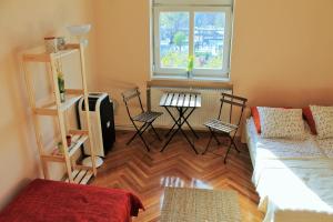 Postel nebo postele na pokoji v ubytování Lidi Guesthouse