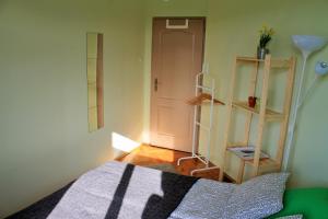 Postel nebo postele na pokoji v ubytování Lidi Guesthouse