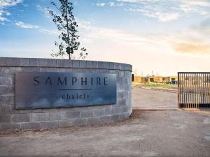a sign that readsennaime chicals on a brick wall at Samphire Chalet Peppermint - Experience Eco-Luxury in Geographe