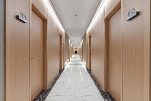 a row of stalls in a hallway of a building at GH Hotel in Chengdu