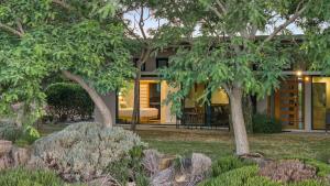 a house with a garden in front of it at Petra Olive 5 in Yallingup
